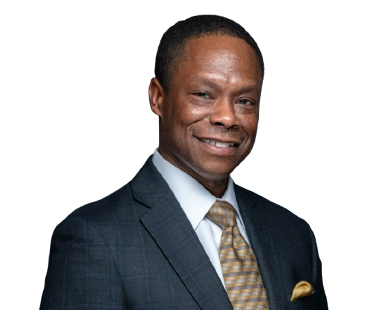 Man in suit and tie smiling, professional portrait.