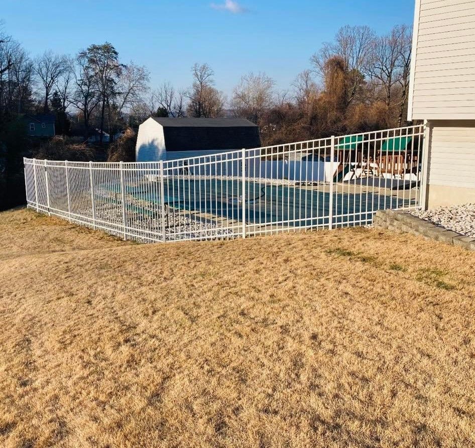 White Metal Pool fence installed by Bowles Fence Company.