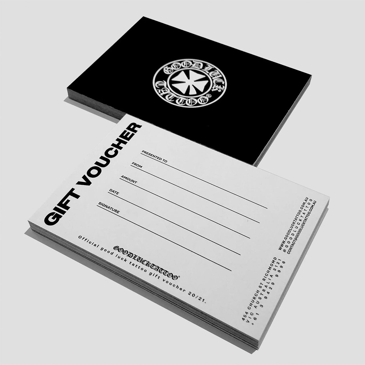 a black and white gift voucher from good luck tattoo
