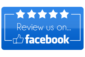 A blue sign that says review us on facebook with a thumbs up.