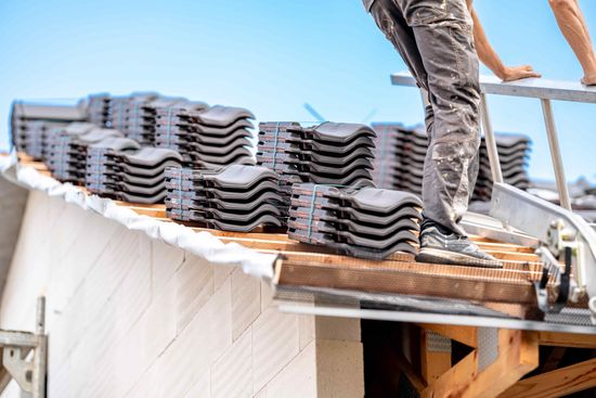 Craftsman working on roof installation