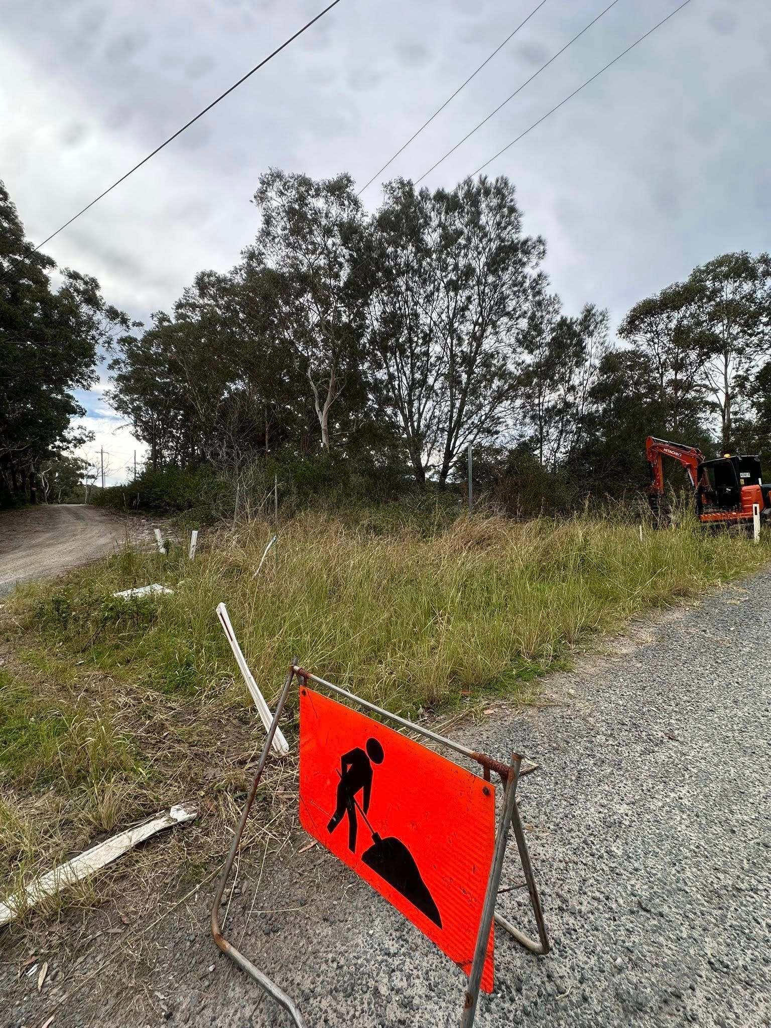Road Work Ahead, Orange Sign With Worker — Ace Clearing & Mulching In Forster, NSW