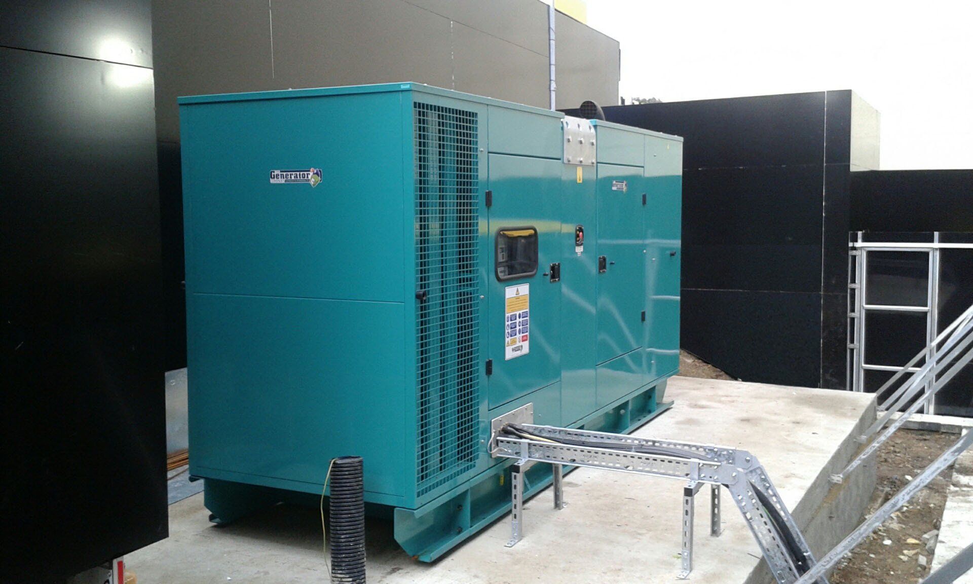 Mobile diesel generator outdoors, ready for emergency electric power use.