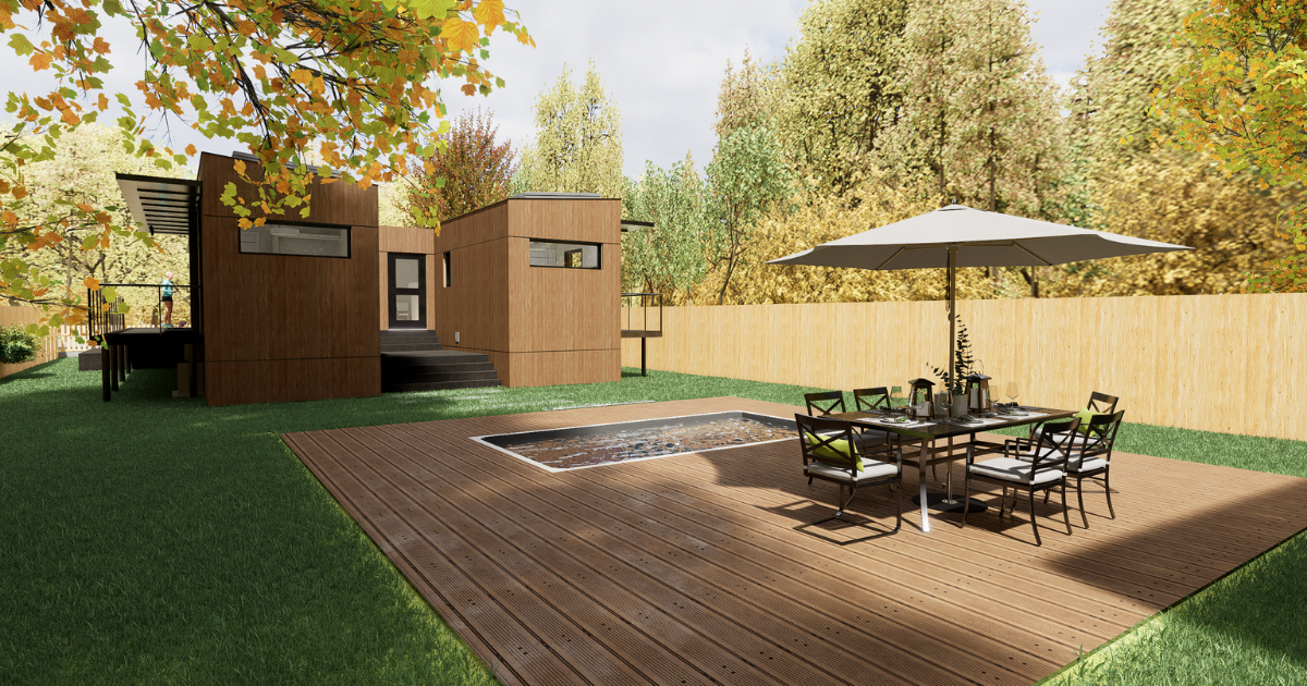 A patio with a table and chairs and an umbrella in a backyard.