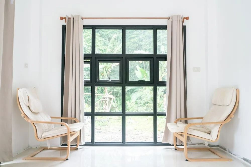 Two Chairs Next to Aluminium Windows — Southside Aluminium Windows and Doors in Yallah, NSW