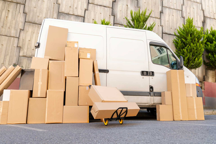 A White Van Is Filled with Many Cardboard Boxes | Tucson, AZ | Big Rick's Moving Co.