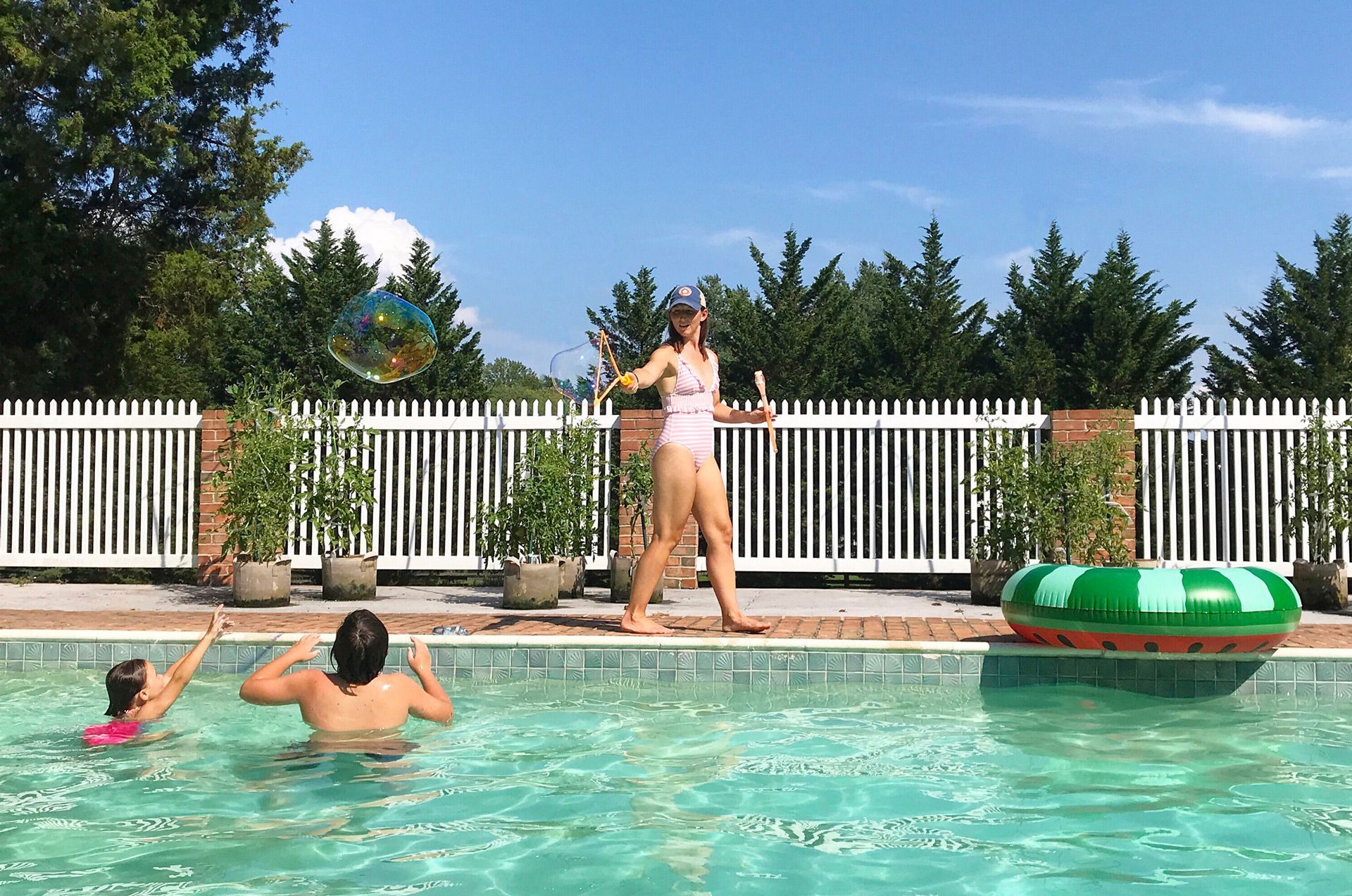 Family Playing in the Pool — St. Peters, MO — Blue Water Pool Service LLC