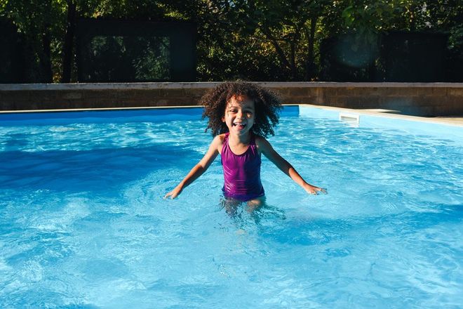 Girl Enjoying the Swimming Pool — St. Peters, MO — Blue Water Pool Service LLC