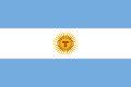The flag of argentina is blue and white with a yellow sun and a cross in the center.