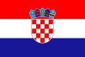 A red , white and blue flag with a checkered coat of arms on it.