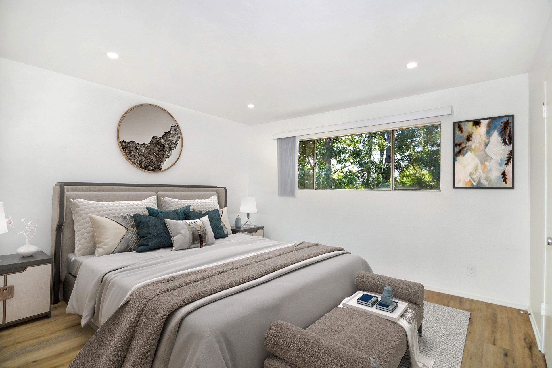 a bedroom with a large bed and a window