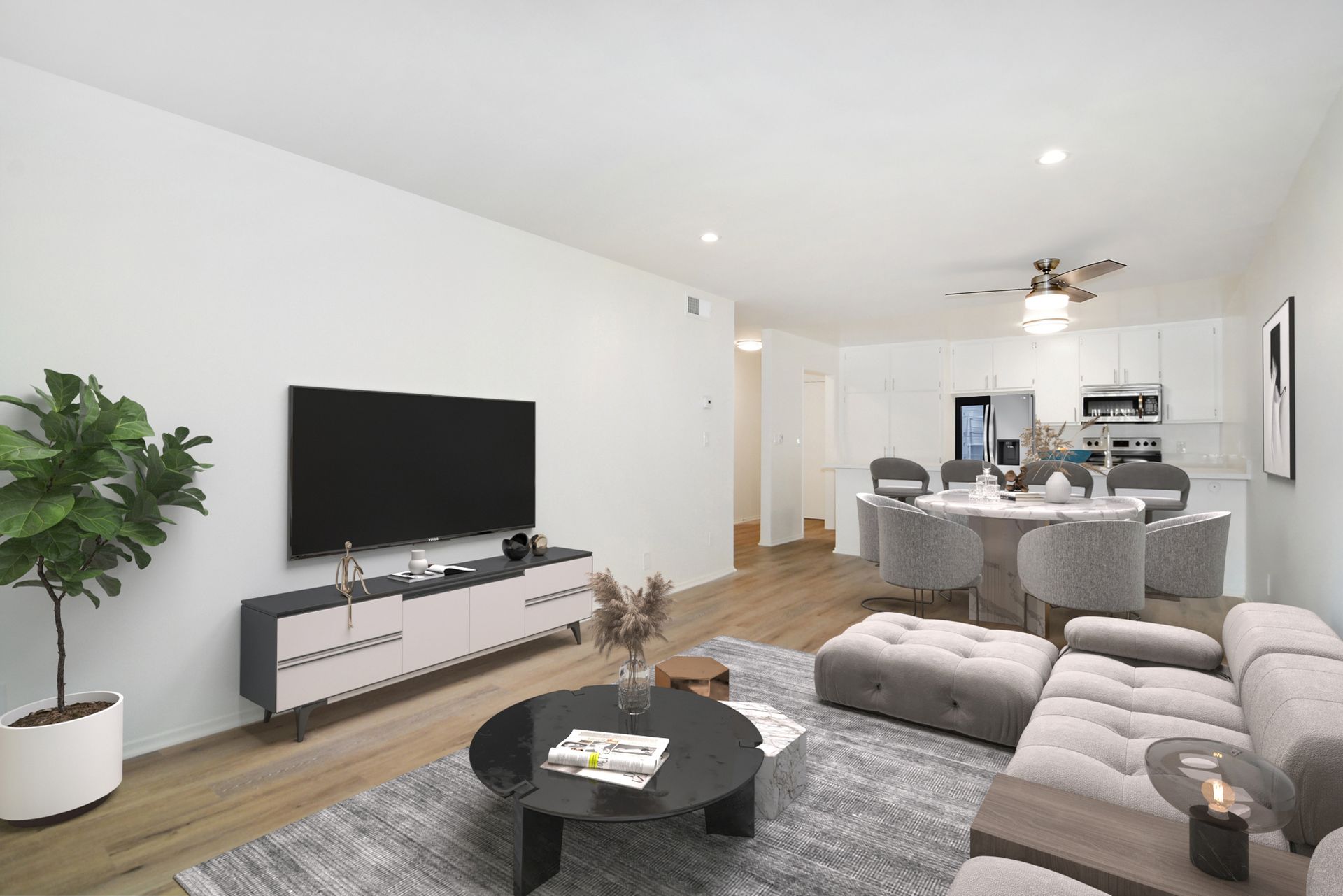 a living room with a couch and a flat screen tv
