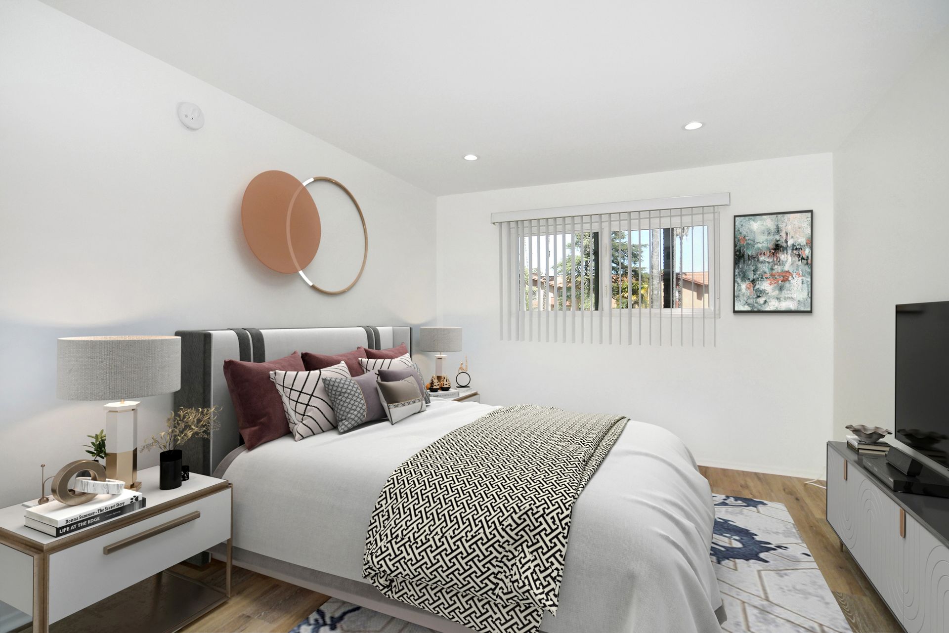 a bedroom with a large bed , nightstand , and television .
