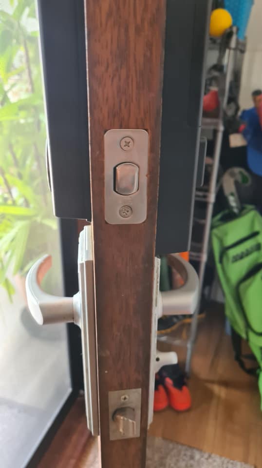 Side View Of Wooden Door With Lock — Locksmiths In Thuringowa Central, QLD