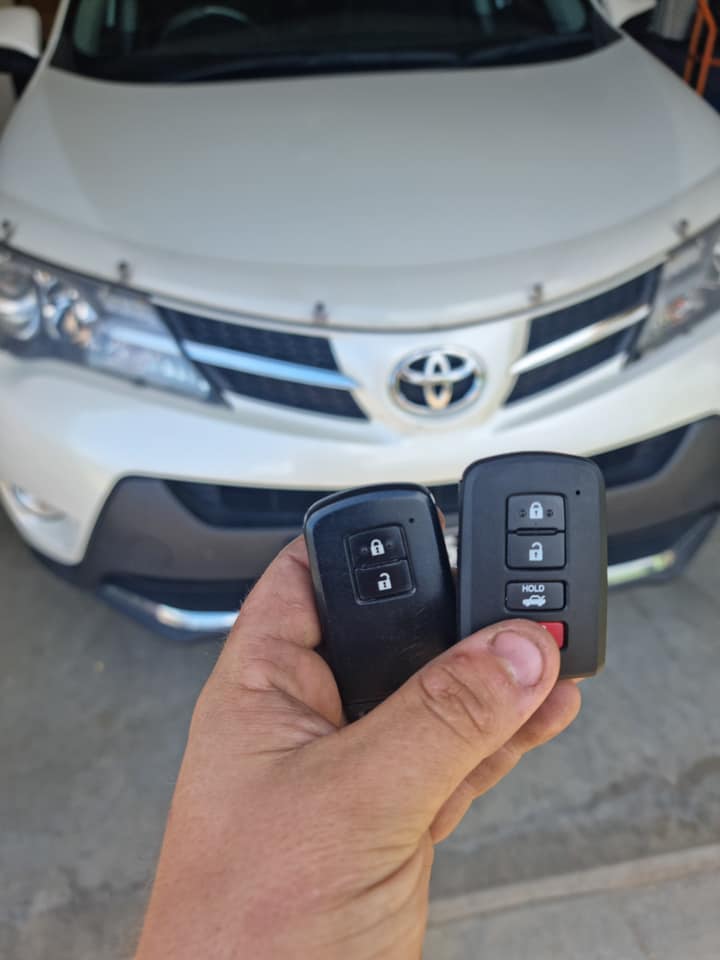 White Car With Two Remote Keys — Locksmiths In Thuringowa Central, QLD