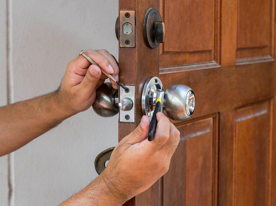 Locksmith Repair The Silver Door Knob — Locksmiths In Thuringowa Central, QLD