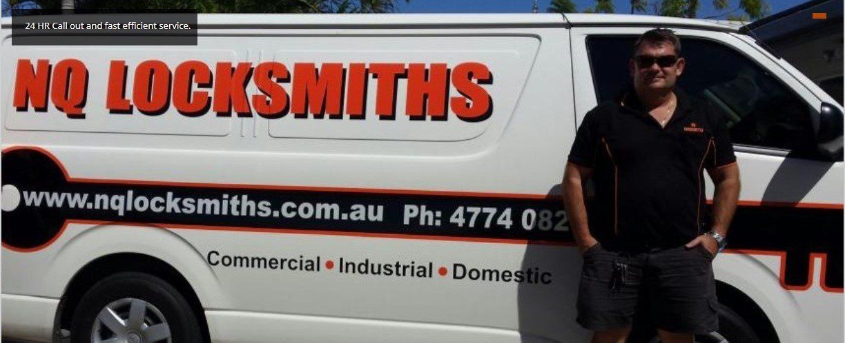 Man Standing Beside The White Van — Locksmiths In Thuringowa Central, QLD