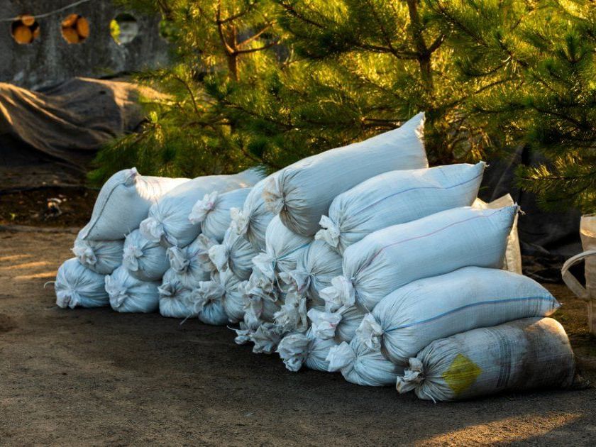 A Bunch of Bags Are Stacked on Top of Each Other on the Ground — FarmCare in Mullumbimby, NSW