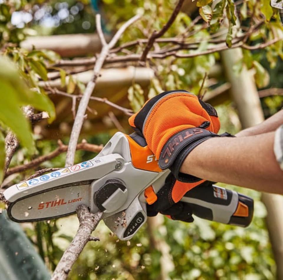 Stihl Chainsaw & Safety Gloves — Farm Equipment Experts In Mullumbimby, NSW