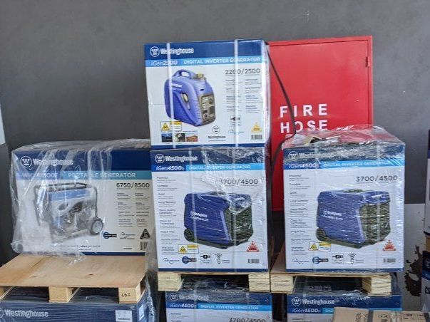 Boxes of Generators Are Stacked on Top of Each Other on Wooden Pallets — FarmCare in Mullumbimby, NSW