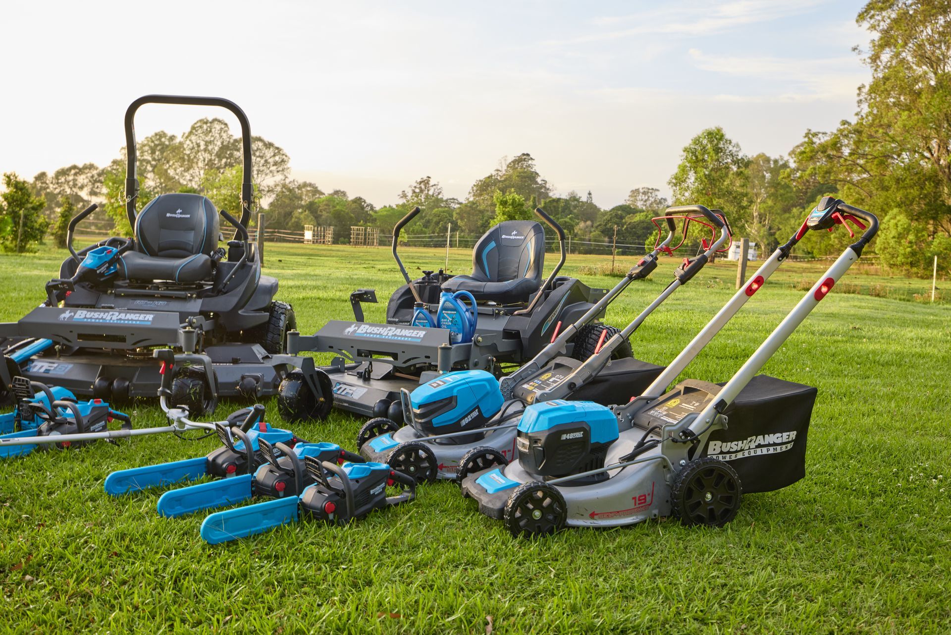 line up of bushranger push mowers and ride on mowers