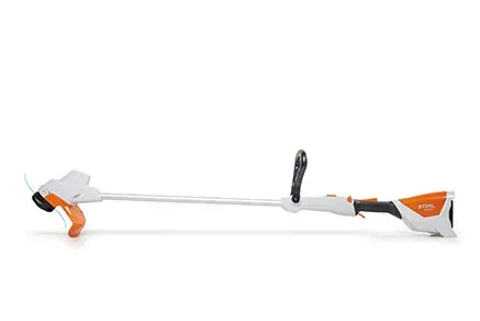 A Stihl Trimmer is Sitting on a White Surface — FarmCare in Mullumbimby, NSW