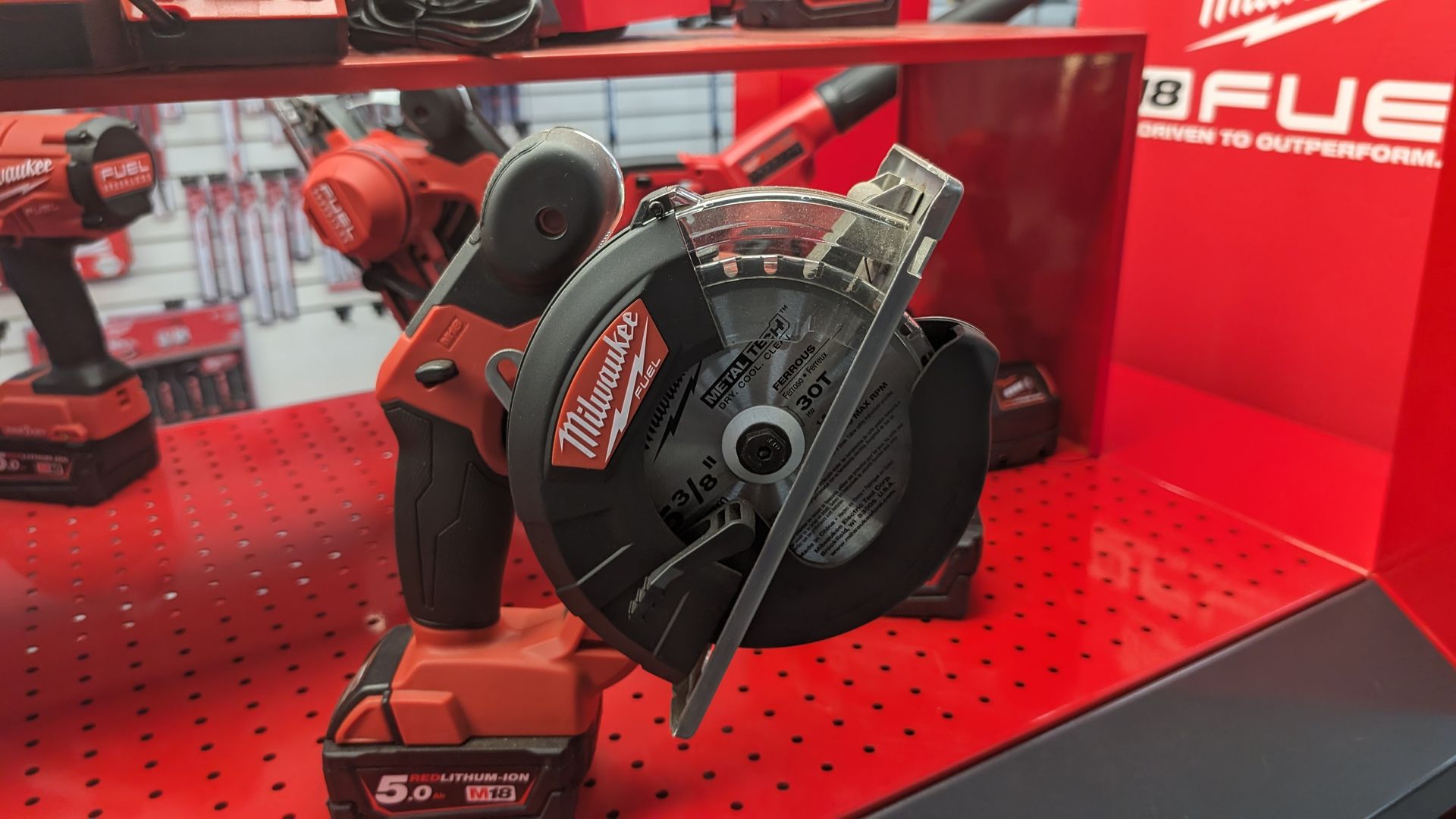 A Red Box With a Power Drill on it — FarmCare in Mullumbimby, NSW