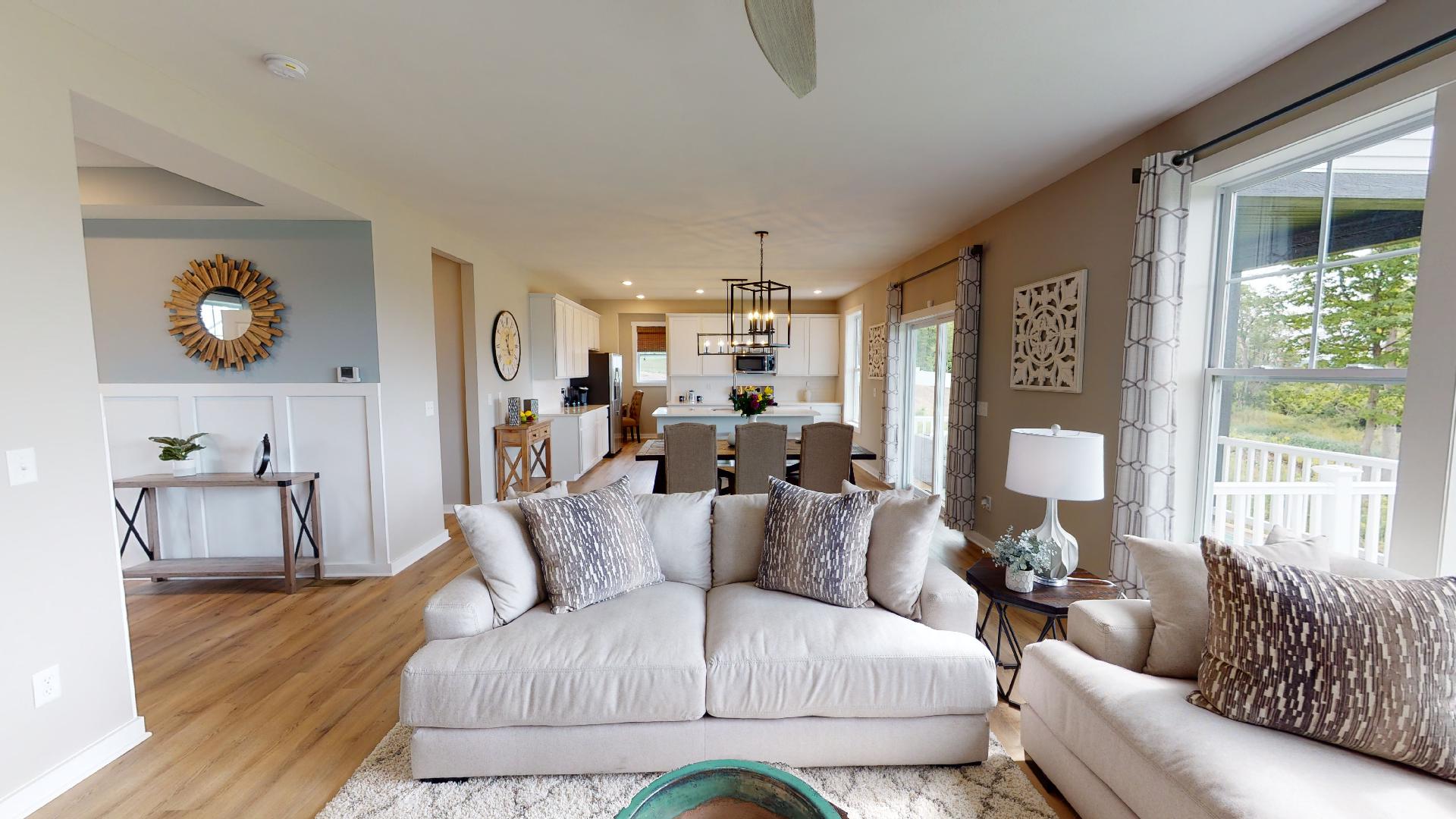 living room with dinning room in background