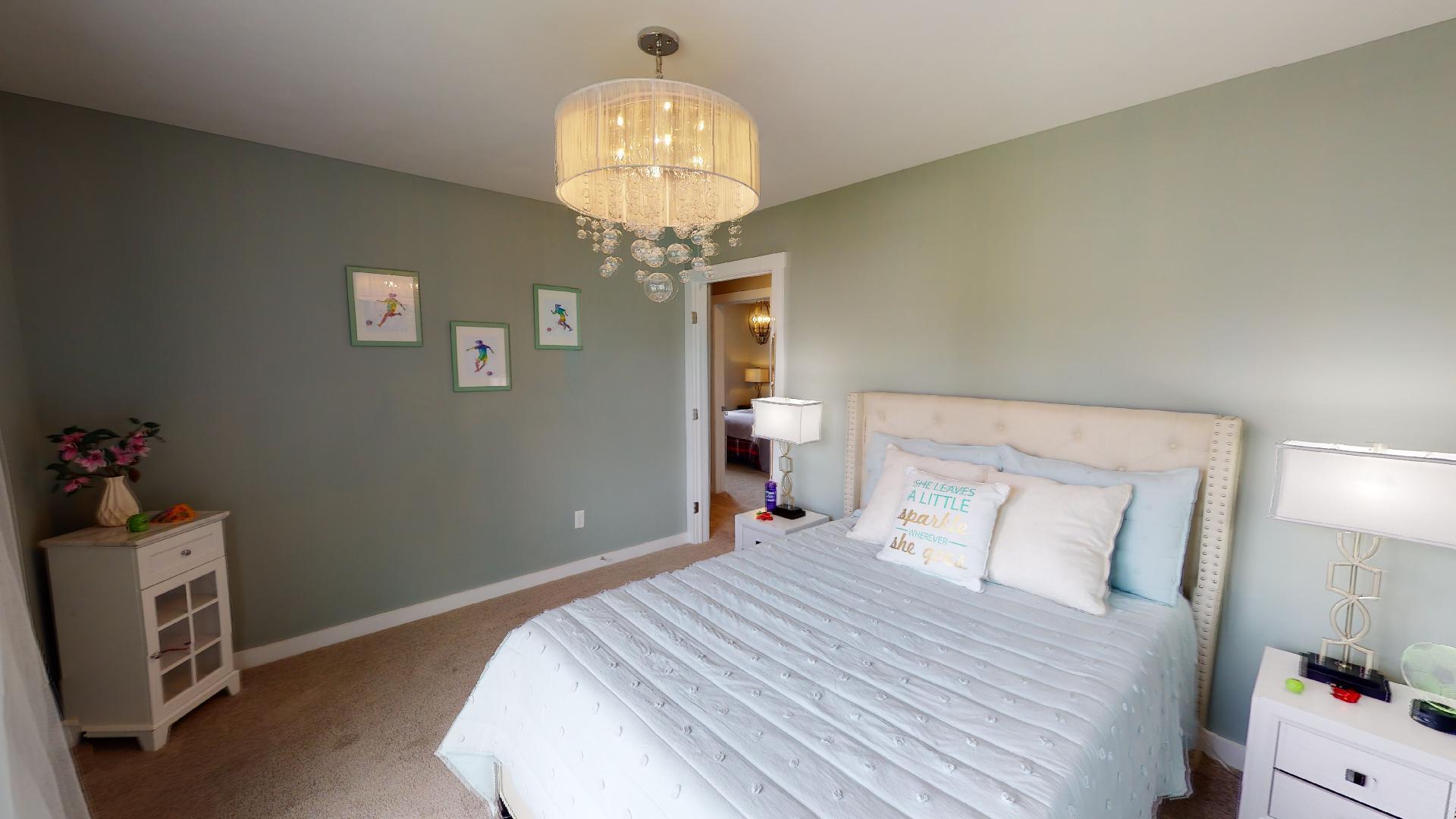 bedroom with bubble light fixture