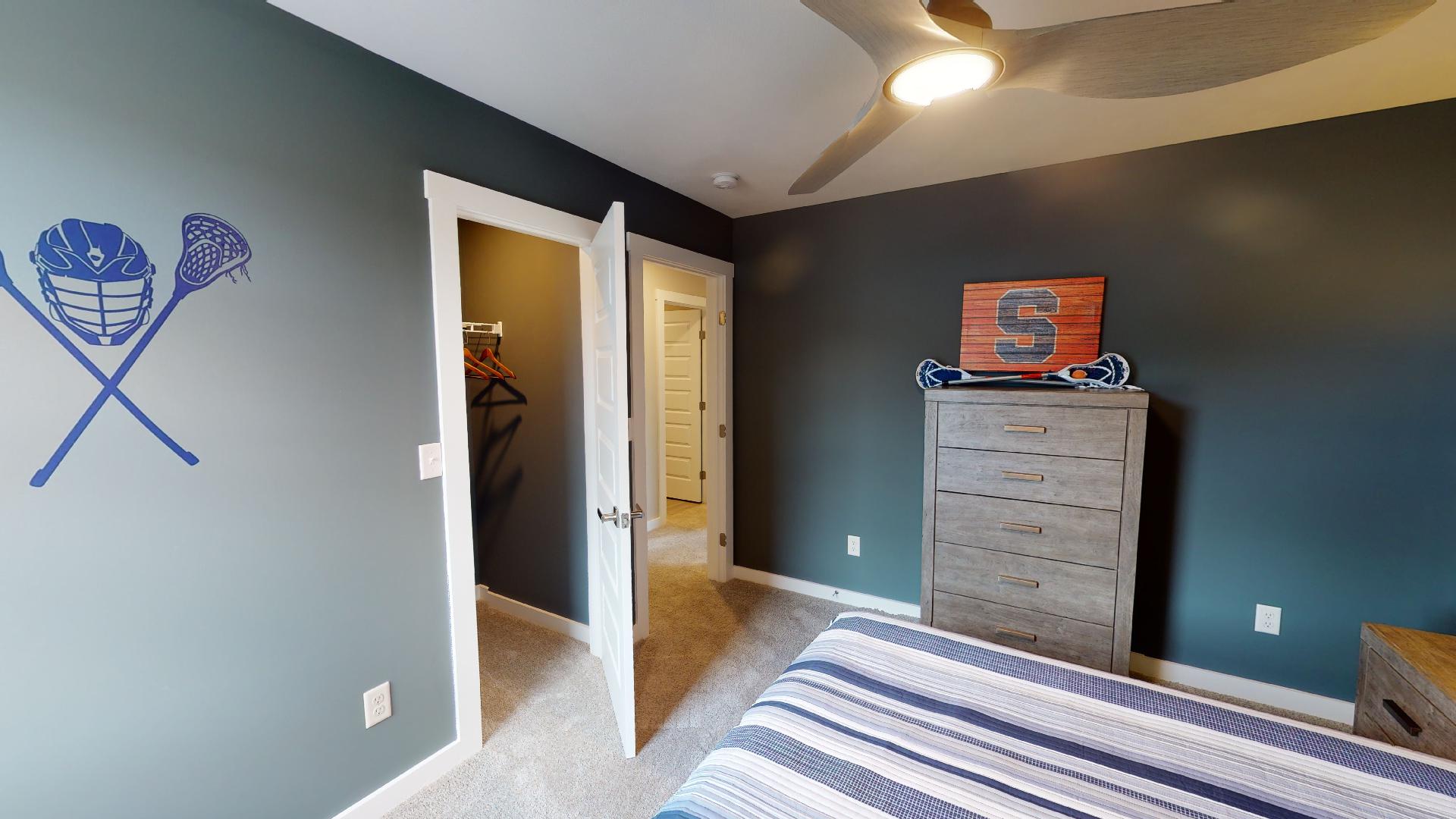 bedroom with walk-in closet