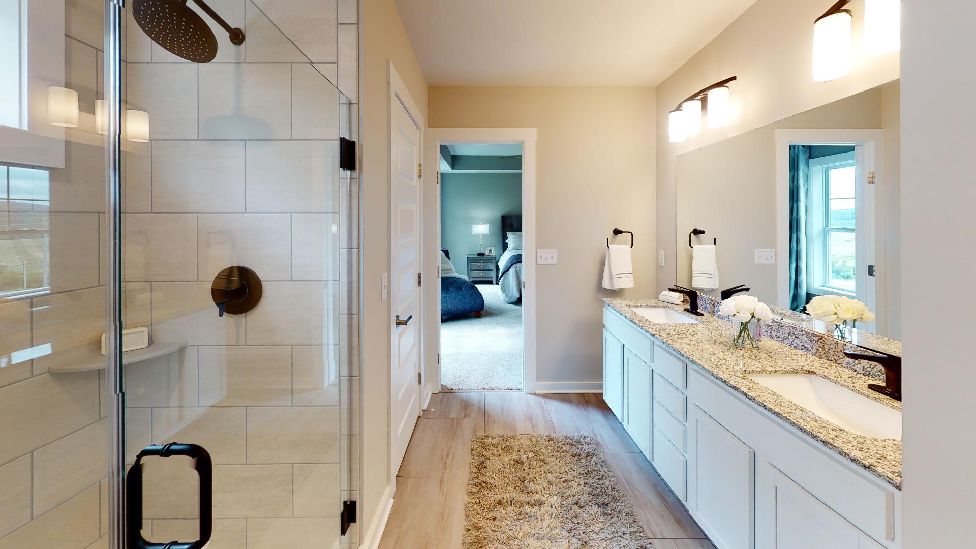 double vanity and tile shower