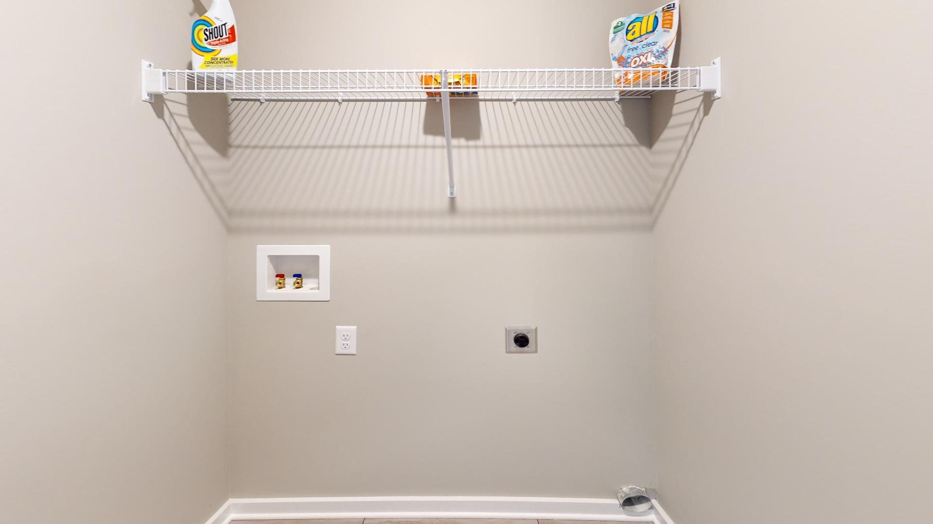 laundry room with wire shelf
