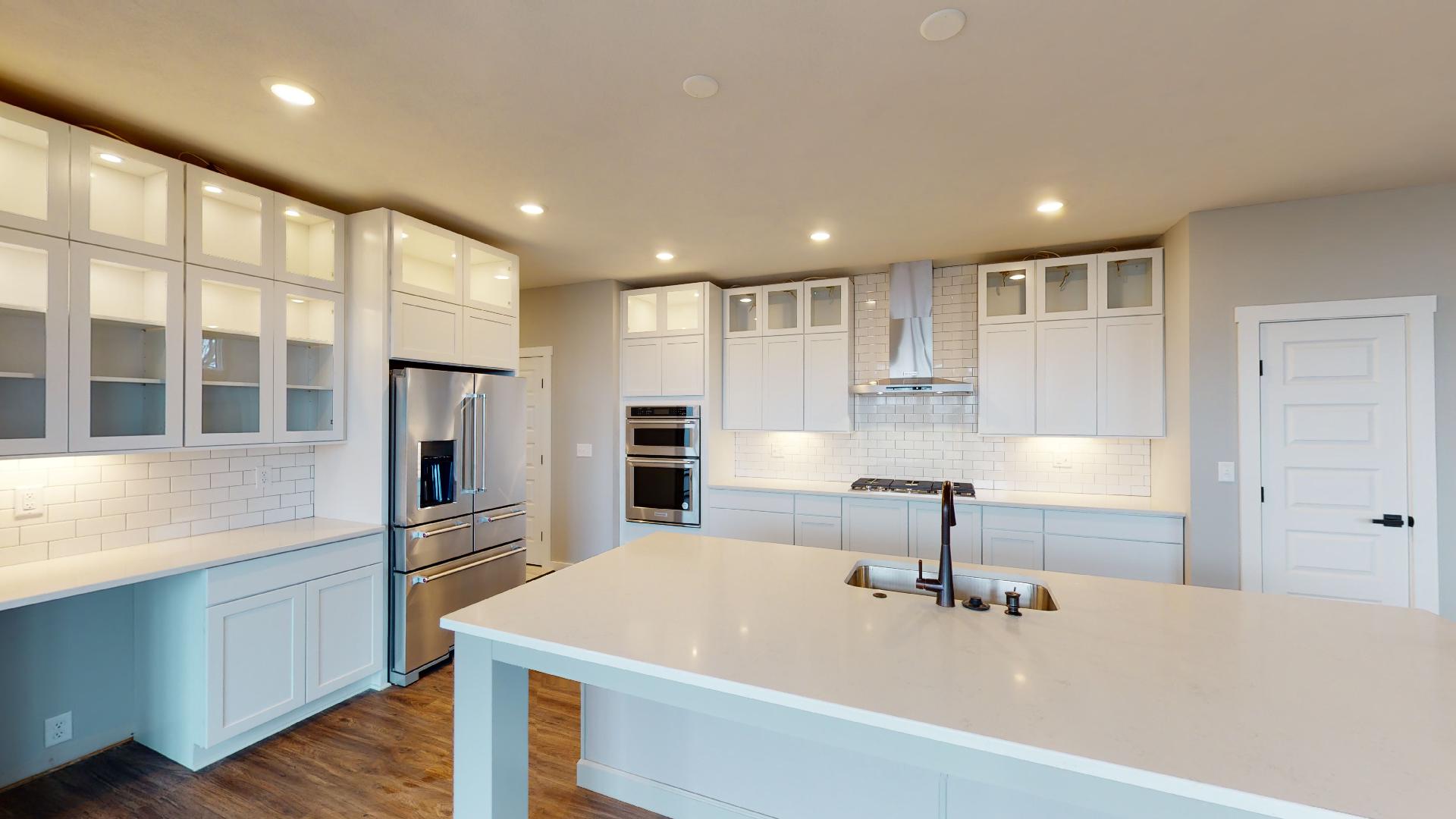 kitchen with stainless steel appliances and island