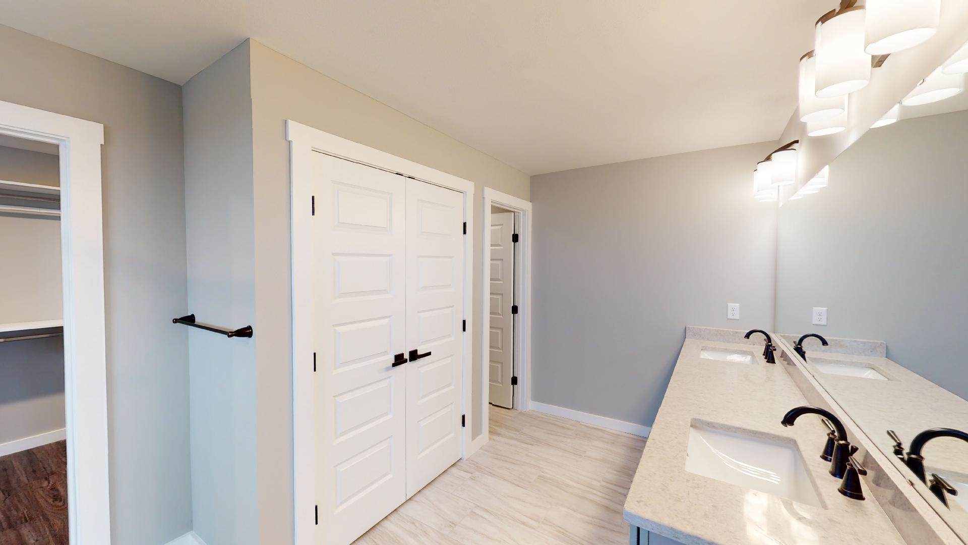 primary bathroom with double vanity