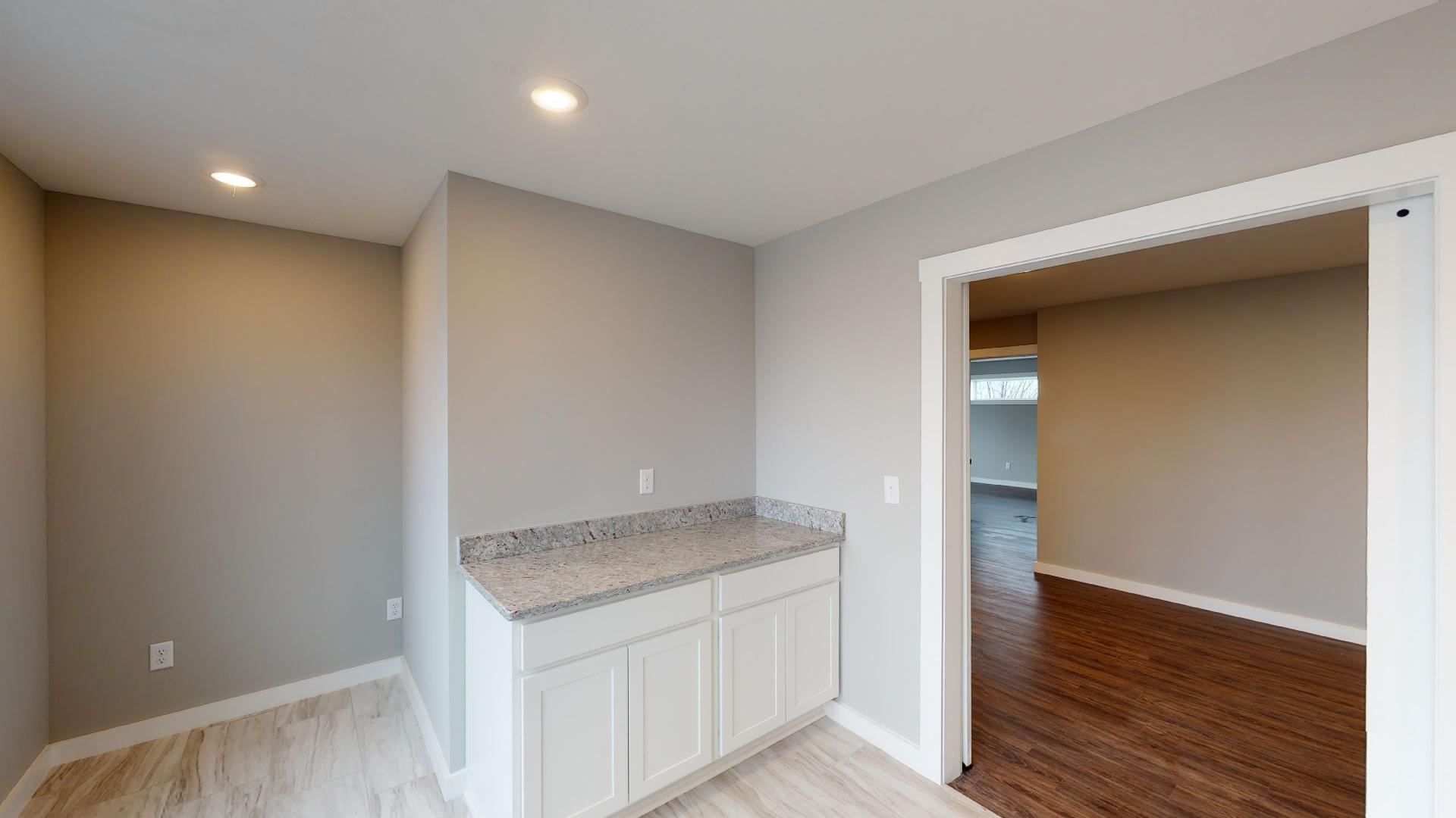 laundry room with cabinets