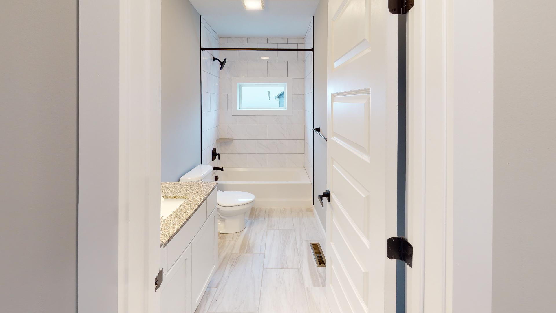 bathroom with tub and shower combo
