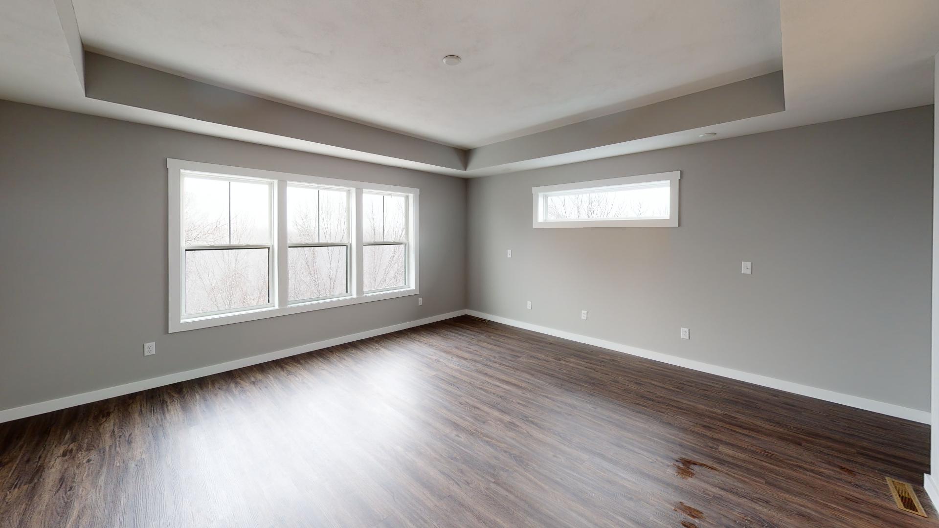 primary bedroom with recessed lighting