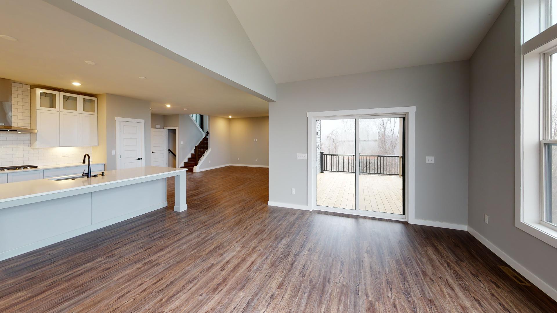 dining room with patio door and kitchen