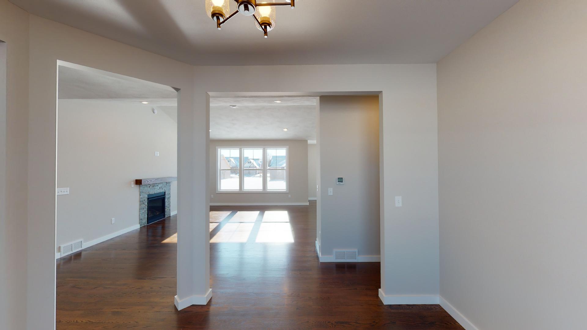 dining room with living room in background