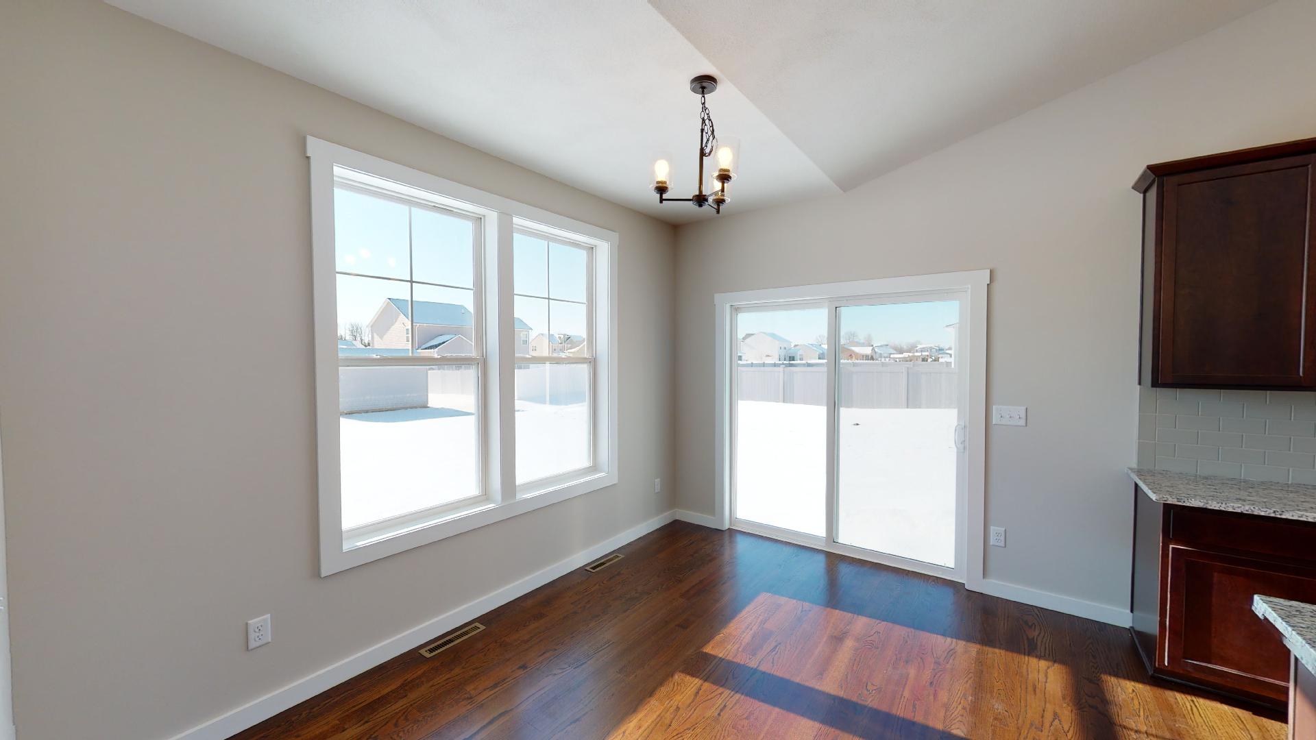 dinette with sliding door to backyard