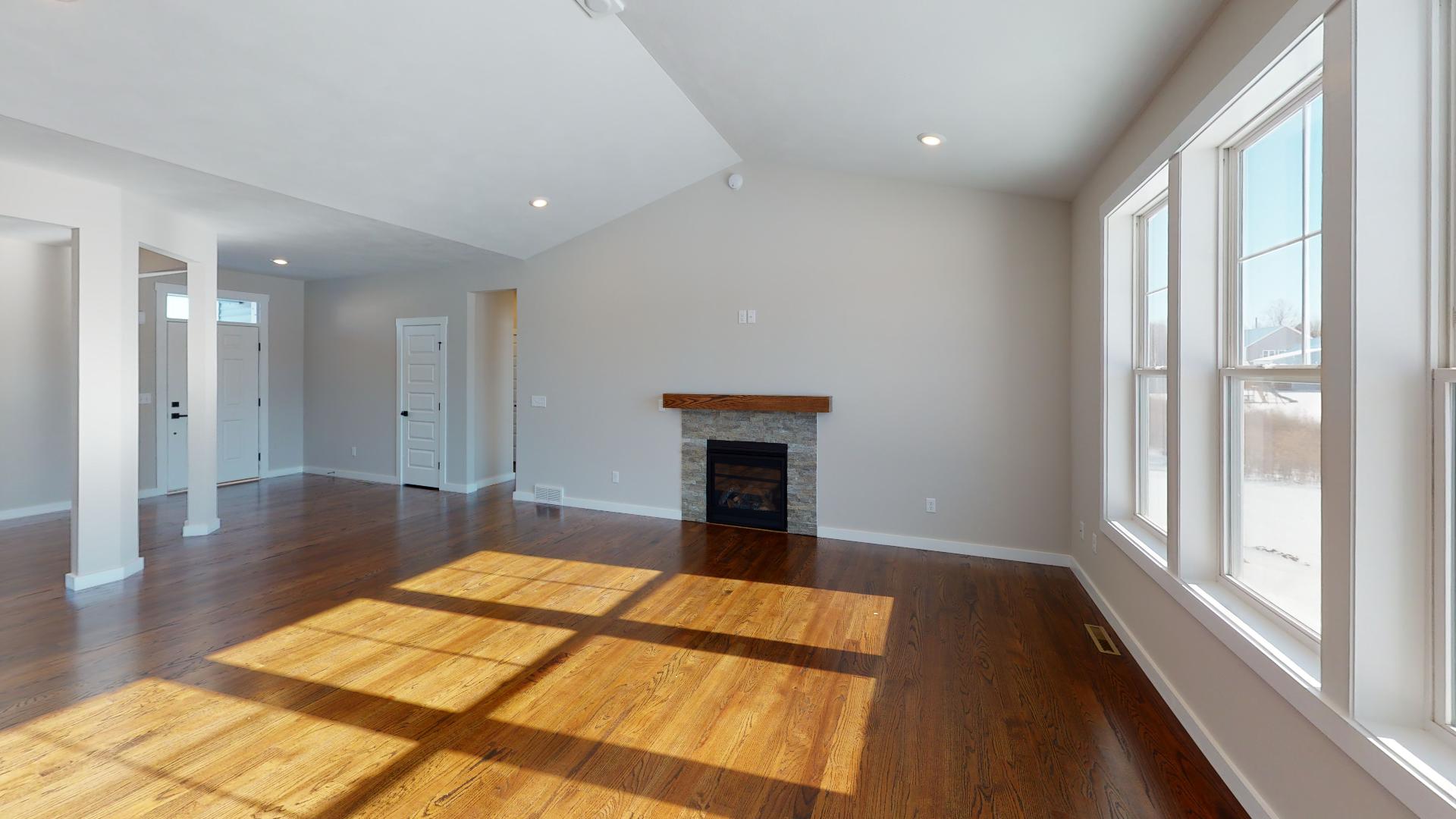 living room with vaulted ceiling
