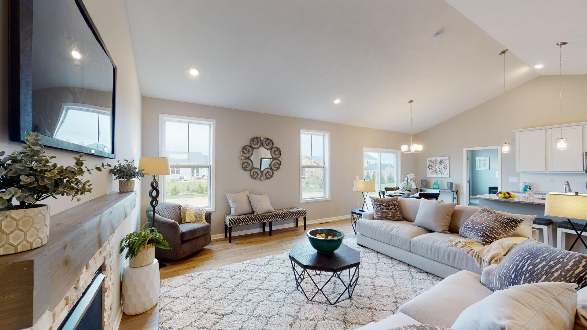 living room with kitchen in background
