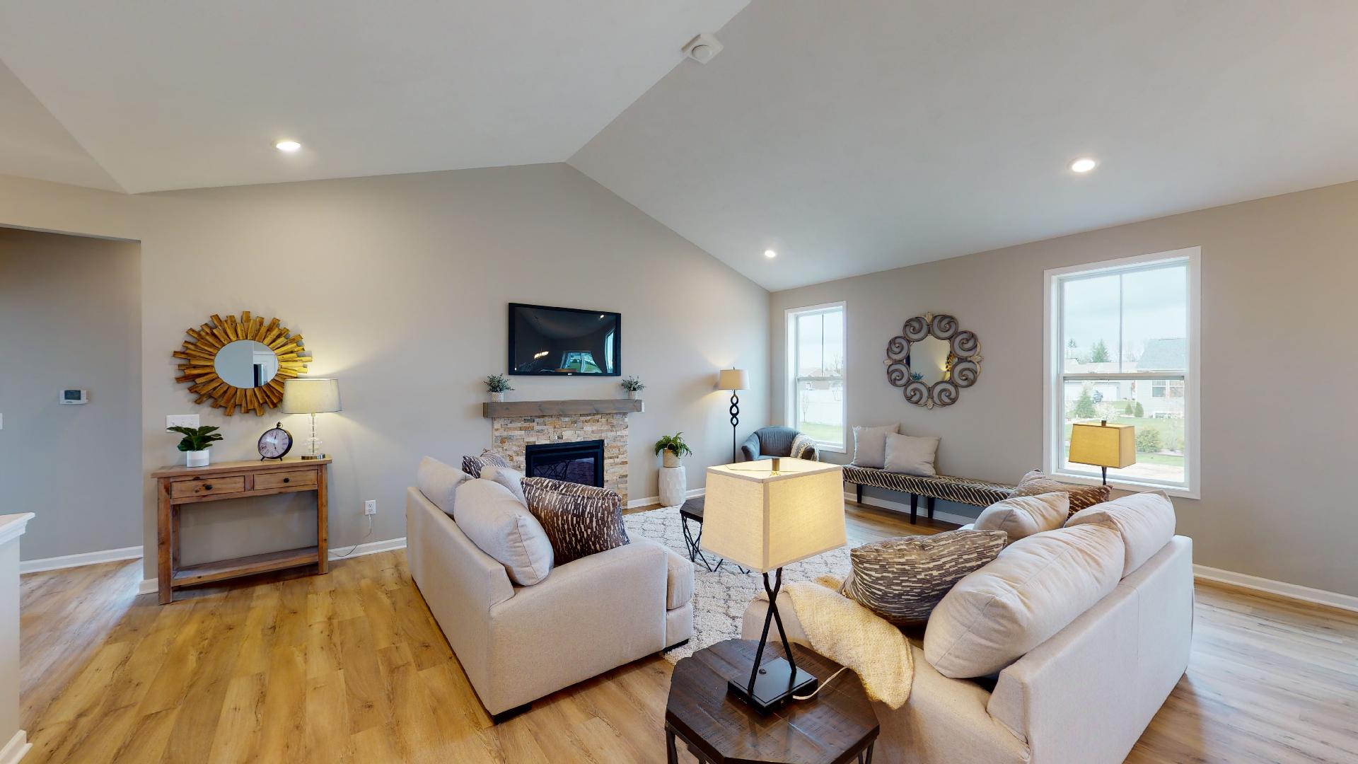 living room with vaulted ceiling
