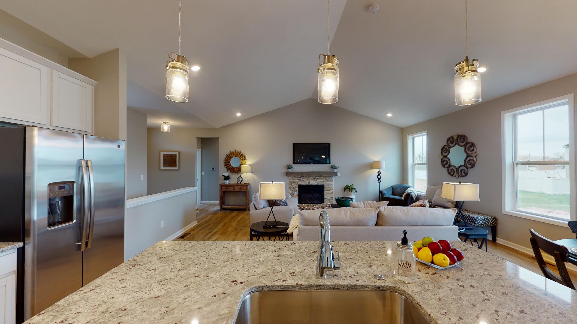 kitchen with living room in background