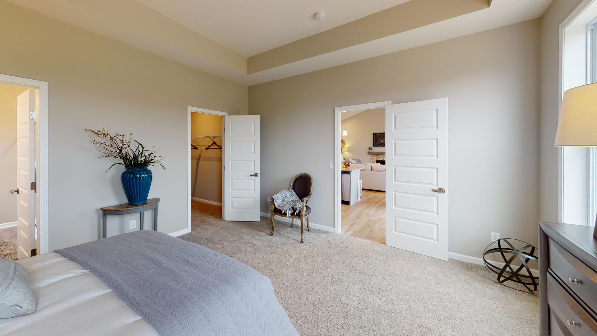 primary bedroom with ensuite bathroom