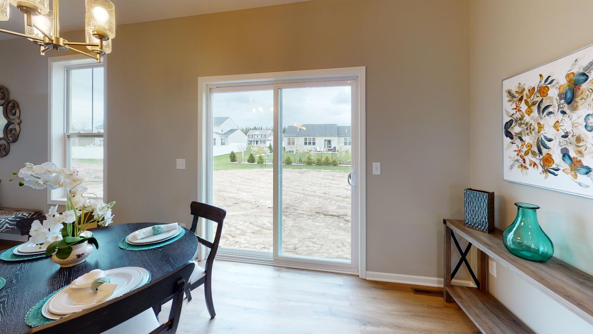 door to backyard and console table