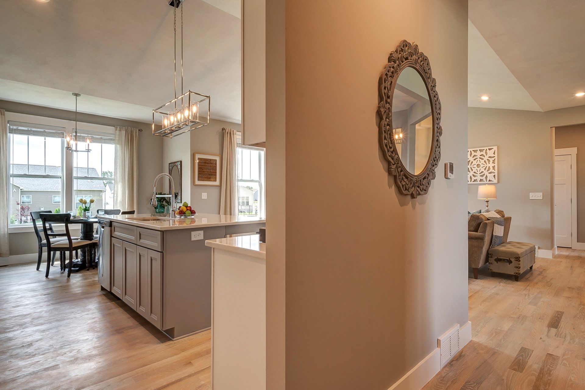 wall with kitchen with dinette in background