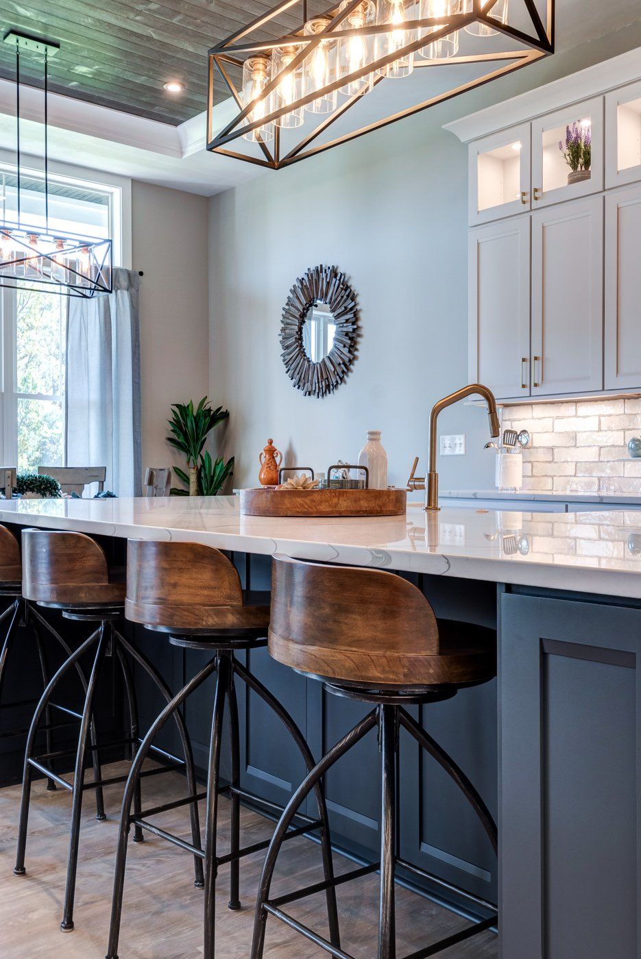 kitchen island with sink and seating