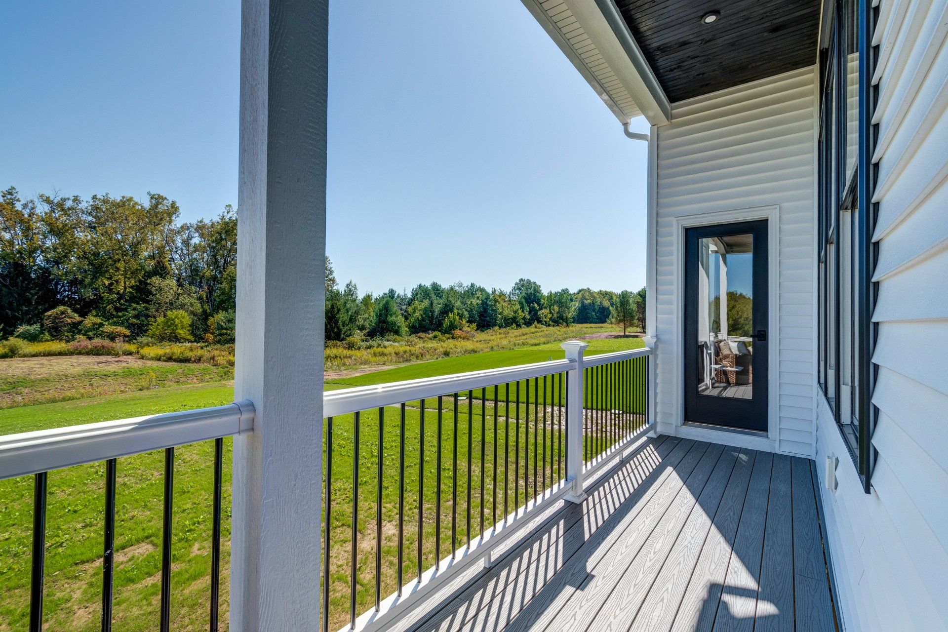 door and balcony with railing