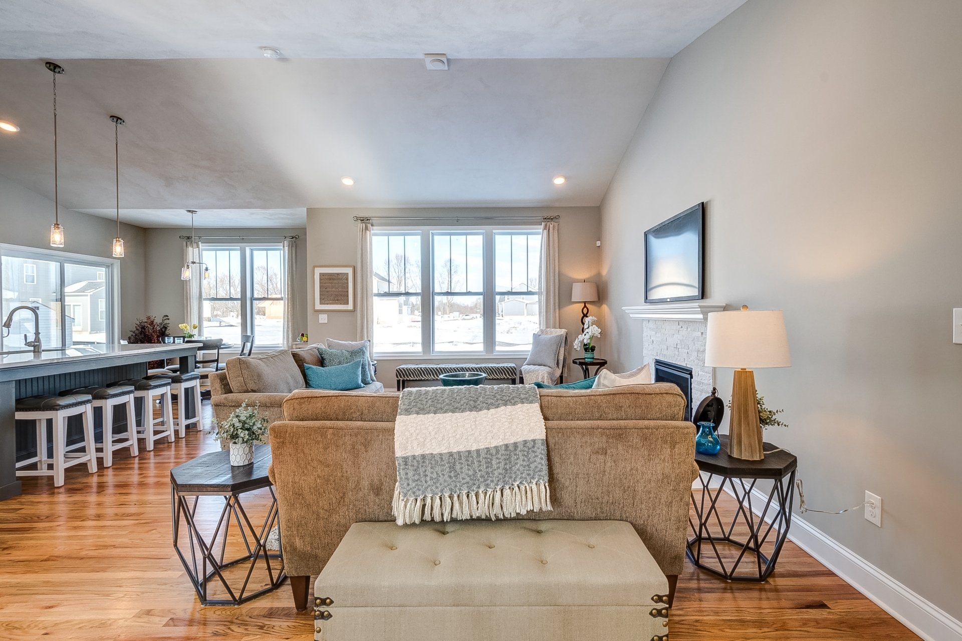two end tables and loveseat in living room